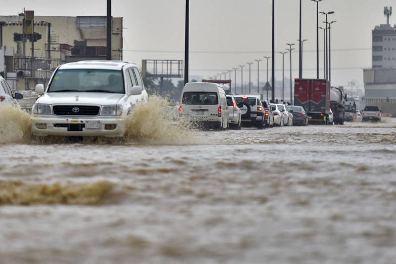 The water snarled traffic and partially submerged some vehicles. AFP
