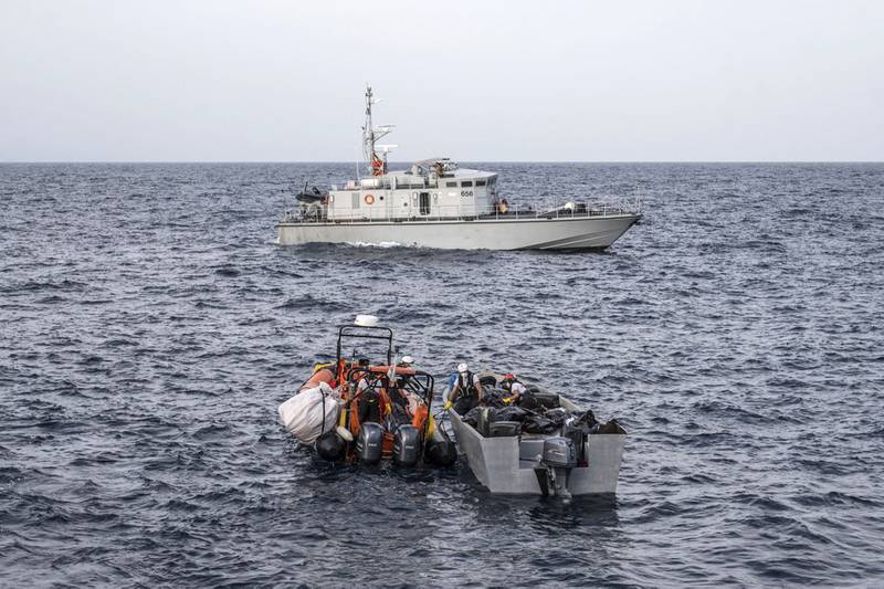 Boat crew taking part in a search and rescue operation to aid migrants in the Mediterranean. AFP