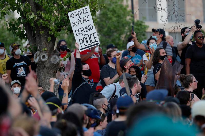 Protesters rally outside city hall in Tempe, Arizona. AP Photo