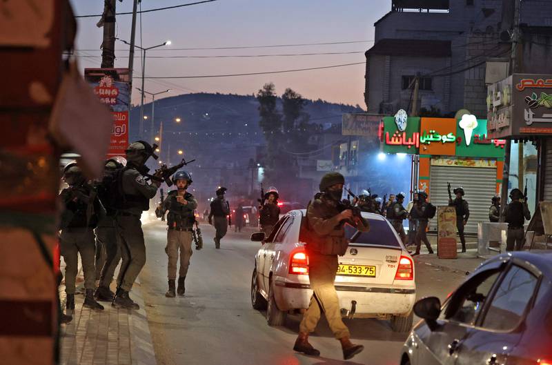 Israeli security forces conduct an operation in the occupied West Bank city of Nablus on December 2. AFP