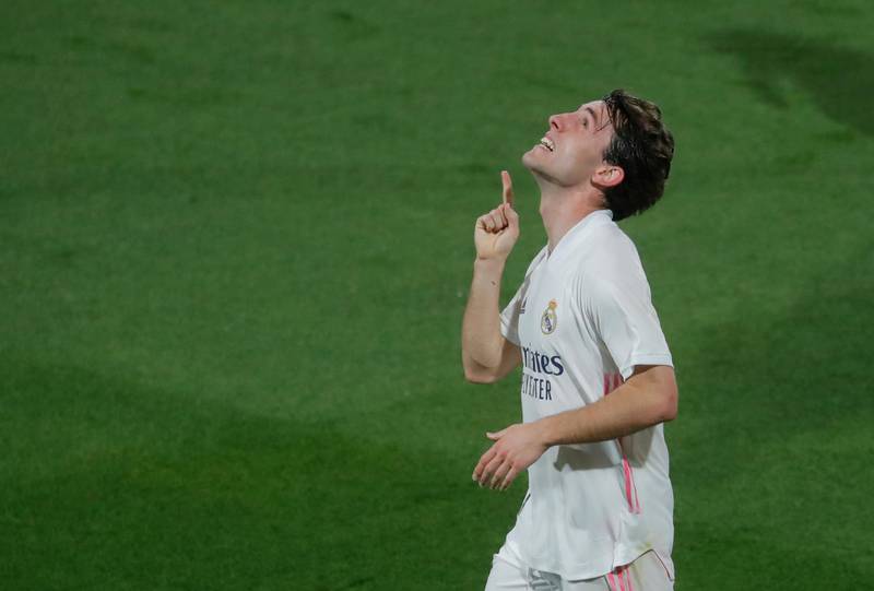 Real Madrid's Alvaro Odriozola celebrates scoring their second goal against Cadiz. Reuters