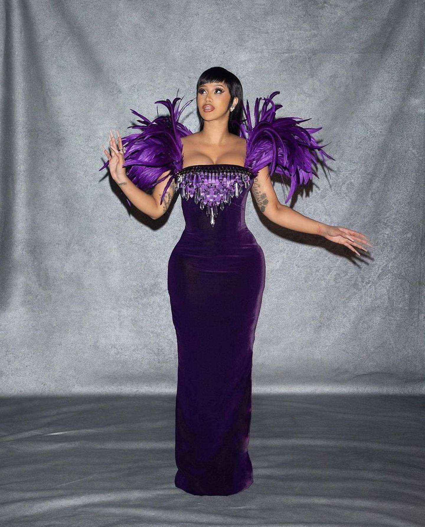 To host the American Music Awards in November, singer Cardi B wore a black and purple feather dress by Lebanese designer Jean-Louis Sabaji. Getty