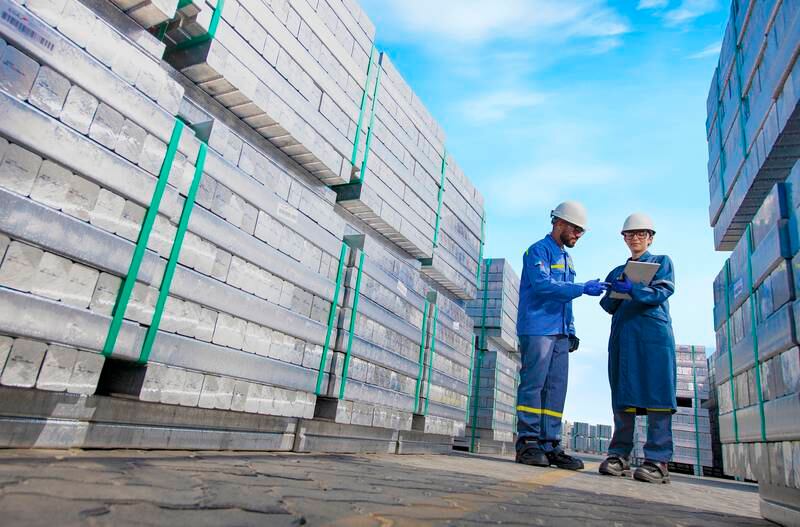 Emirates Global Aluminium employees check inventory at the company's cast-house yard. Photo: EGA