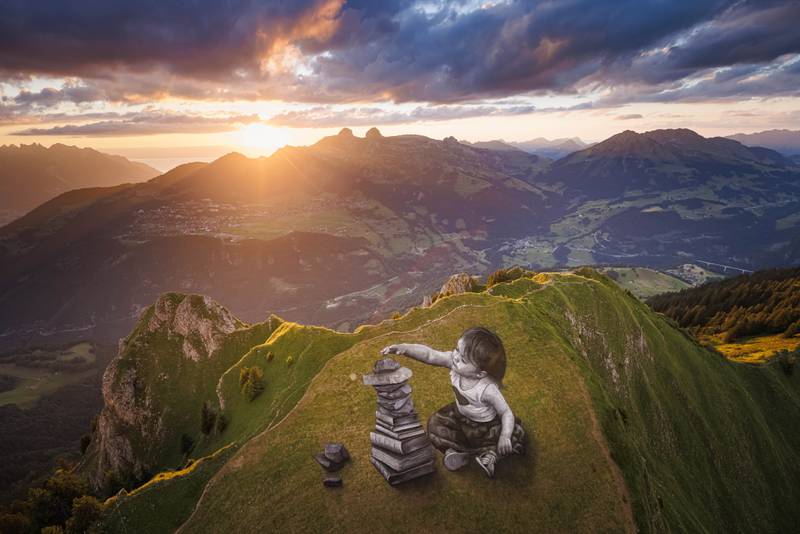 A giant biodegradable landart painting entitled 'Vers l'equilibre' (Towards balance) by French-Swiss artist Saype near the summit of the Grand Chamossaire mountain, above the alpine resort of Villars-sur-Ollon, Switzerland.  The 2,500-square-metre fresco was created using biodegradable pigments made from charcoal, chalk, water and milk proteins. AP