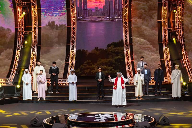 The 12 contestants of 'Munshid Al Sharjah' 2022 at Al Majaz Amphitheatre at the start of the quarter-finals. Photo: NNCPR