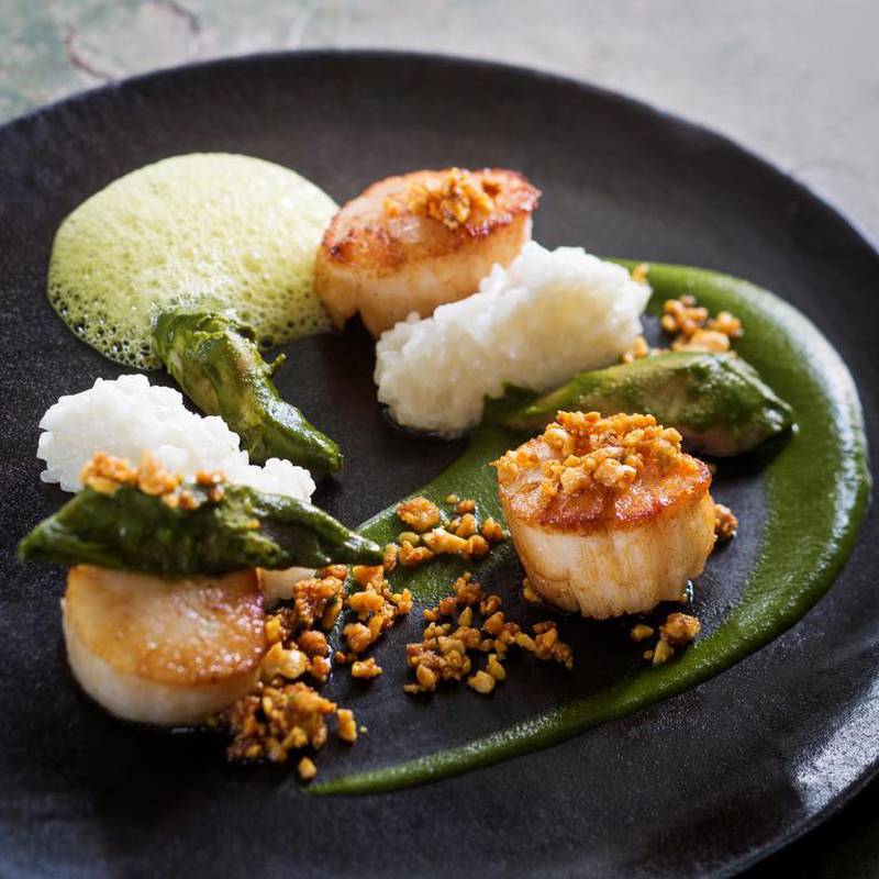 Seared Scallops with Duck Green Curry at Esquina in Singapore. Courtesy Esquina