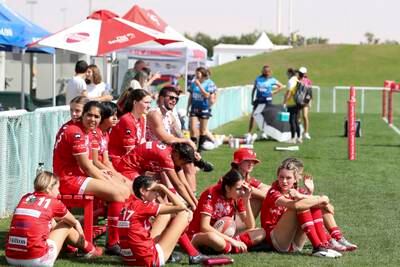 Dubai Tigers Girls U19 await their next game at the HSBC Rugby Festival.