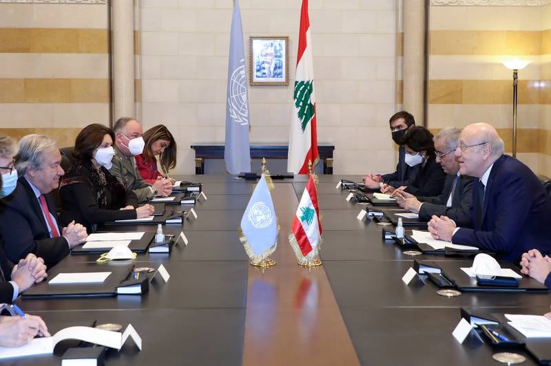 A handout photo made available by Dalati and Nohra shows Lebanese Prime Minister Najib Mikati (R) meeting with Antonio Guterres (L), Secretary-General of the United Nations at the Government palace in downtown Beirut, Lebanon, 20 December 2021. EPA