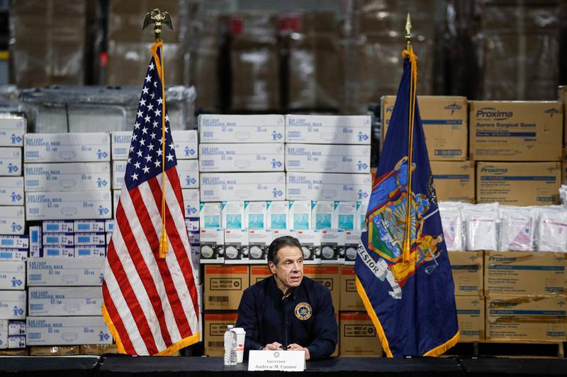 FILE - In this March 24, 2020, file photo New York Gov. Andrew Cuomo speaks during a news conference against a backdrop of medical supplies at the Jacob Javits Center that will house a temporary hospital in response to the COVID-19 outbreak in New York. (AP Photo/John Minchillo, File)