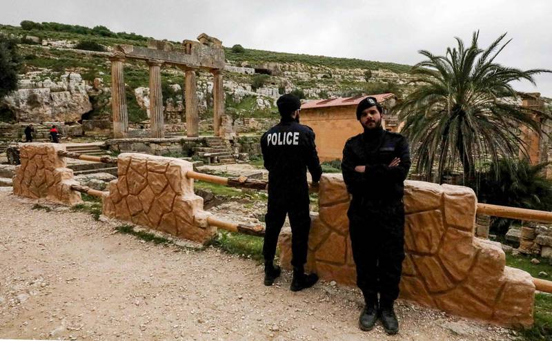 Policemen patrol near the remnants of the Temple of Demeter, dedicated to the ancient Greek goddess of the harvest, in the ruins of the city of Cyrene in eastern Libya. AFP