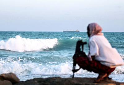 A pirate keeps vigil in north-eastern Somalia. A campaigner says youths need an alternative. Mohamed Dahir / AFP