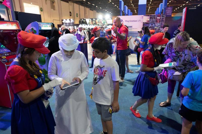 ABU DHABI, UNITED ARAB EMIRATES. 25OCTOBER 2018. Middle East Games Con held at ADNEC. The cities larhgest Games and Anime conference. Gamers enjoy the video games on offer. (Photo: Antonie Robertson/The National) Journalist: Patrick Ryan. Section: National.