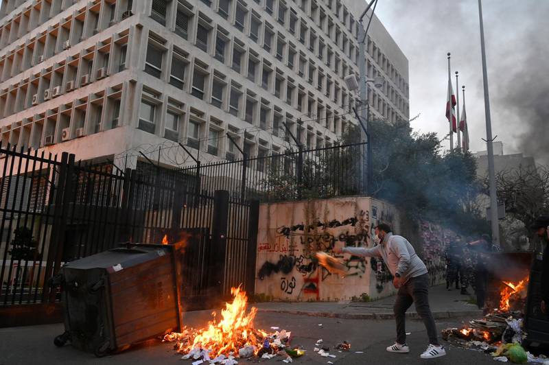 An anti-government protester in front of the Lebanese Central Bank, at Hamra street, Beirut. EPA