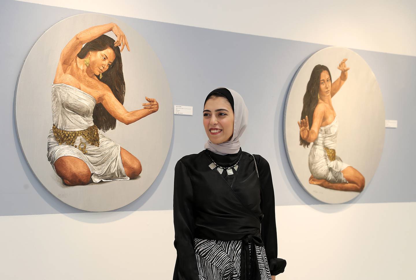 Sara Tantawy with her artwork at Fann A Porter in Dubai. Pawan Singh / The National
