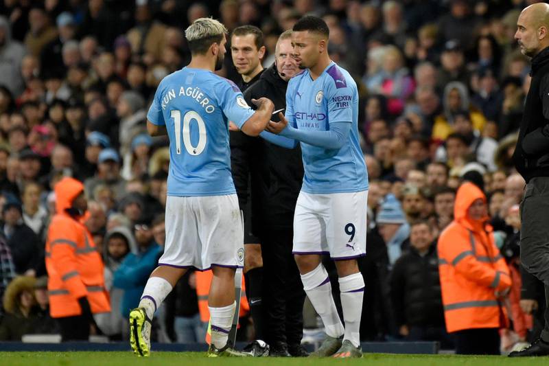 Manchester City's Sergio Aguero, left, is replaced by Manchester City's Gabriel Jesus after getting injured during the English Premier League soccer match between Manchester City and Chelsea at Etihad stadium in Manchester, England, Saturday, Nov. 23, 2019. (AP Photo/Rui Vieira)