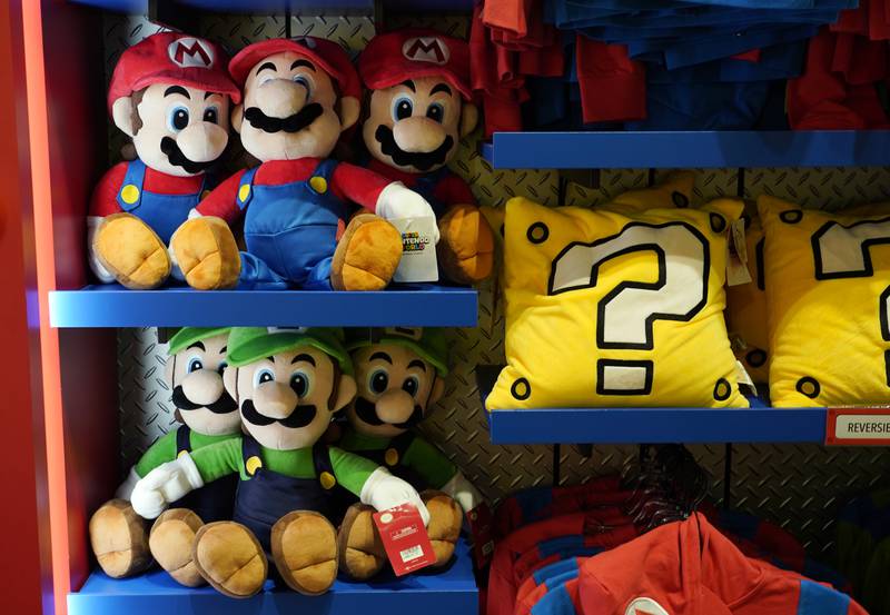 Nintendo-themed toys are displayed inside the 1-UP Factory store. AP