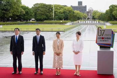 Fumio Kishida, Prime Minister of Japan, and his wife Yuko  with Rishi Sunak and his wife Akshata Murty at the Peace Memorial Park in Hiroshima. AFP