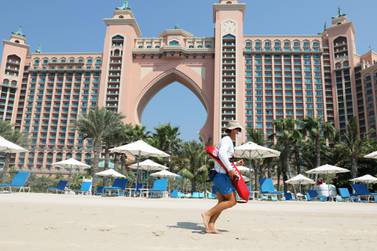 FILE PHOTO: A beach lifeguard is seen at the Atlantis The Palm hotel, as the Emirates reopen to tourism amid coronavirus disease (COVID-19), in Dubai, United Arab Emirates July 7, 2020. REUTERS/Ahmed Jadallah/File Photo