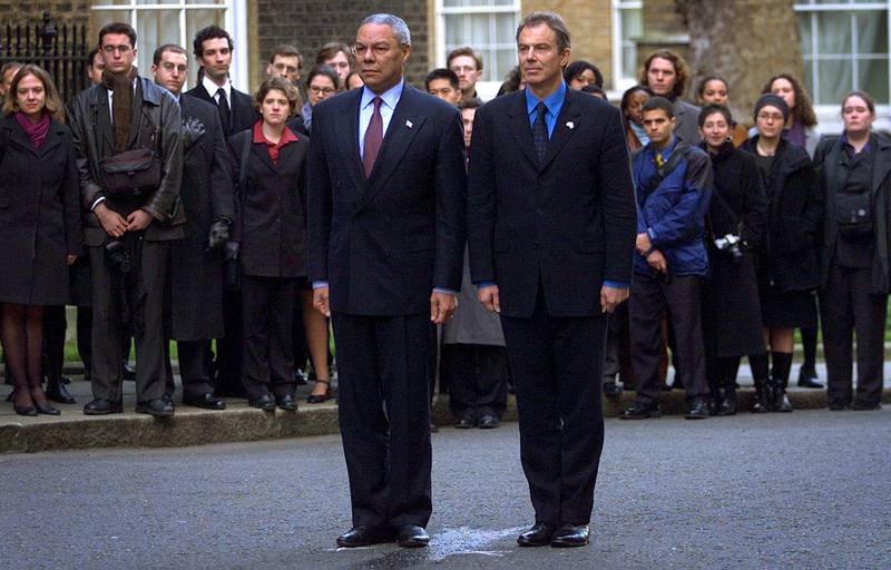 Britain's prime minister Tony Blair with Powell during a special remembrance service in Downing Street, London, in December 2001. The event was in memory of the victims of the September 11 attacks on New York and Washington earlier that year. Reuters