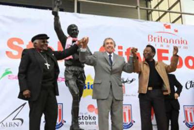 Gordon Banks is flanked by Archbishop Desmdond Tutu and Pele at the unveiling of his statue at his former club Stoke's Britannia Stadium.