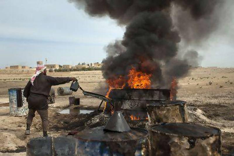 A farmer refining crude oil in Raqqa at the height of the eight-year war in Syria