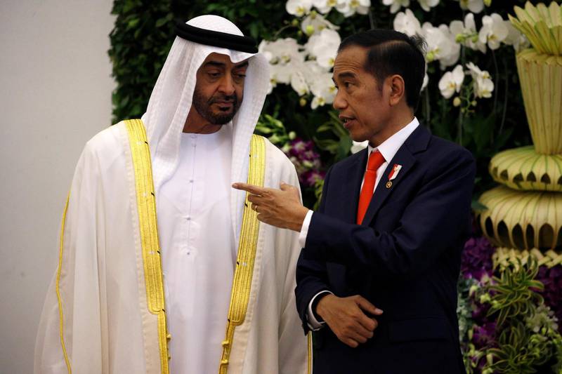 Mr Widodo talks to Sheikh Mohamed at the presidential palace in Bogor, Indonesia. Willy Kurniawan / Reuters
