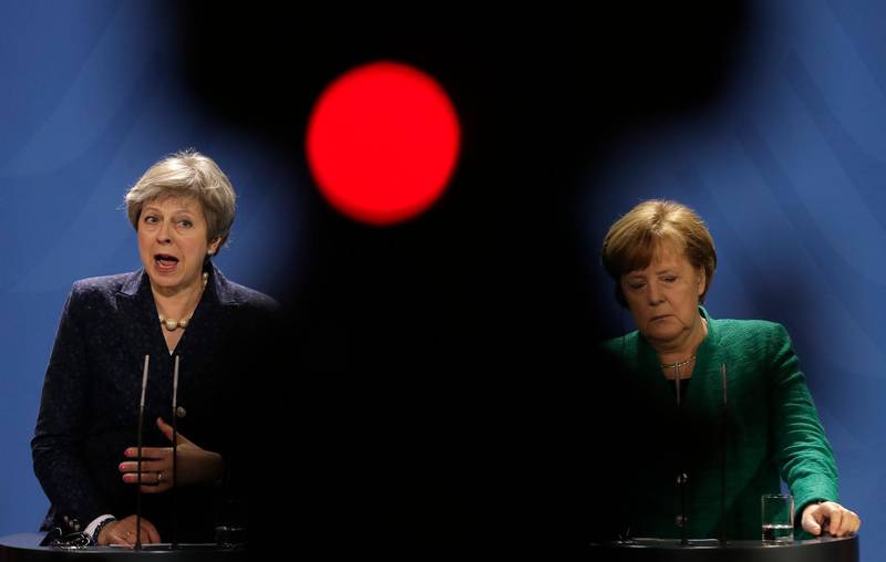 Theresa May during a press conference with German Chancellor Angela Merkel, right, in February 2018. AP Photo