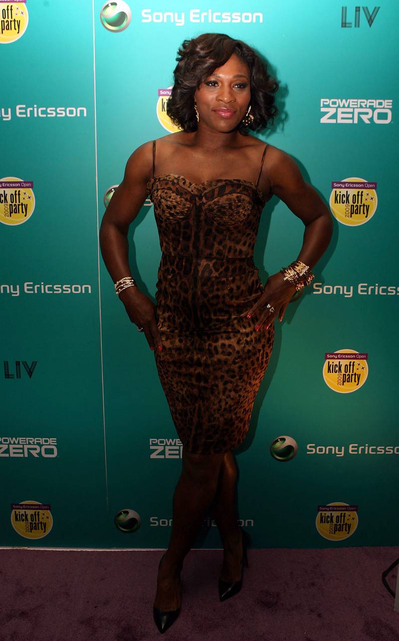 Serena Williams, in a leopard print dress, arrives at the players kick-off party at Liv club, Miami on March 25, 2009. AFP