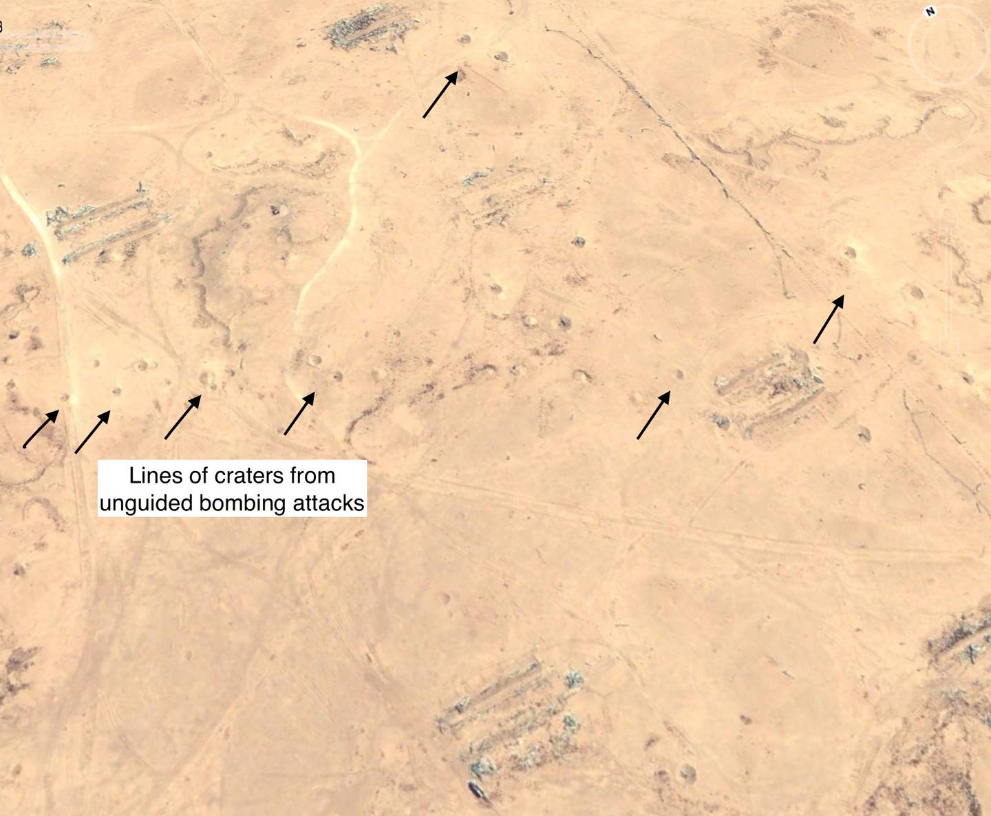 This August 2003 satellite photo shows lines of craters from unguided bombs at Iraq's Al Muhammadiyat chemical weapon storage facility, which was attacked in 1991 with 1,200 laser-guided and unguided bombs, destroying 40 warehouses and numerous bunkers. Google Earth.