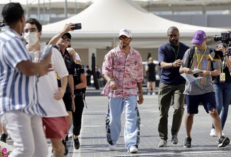Mercedes' Lewis Hamilton arrives at Yas Marina Circut ahead of Friday's first practice for the 2022 Etihad Airways Abu Dhabi Grand Prix. Reuters