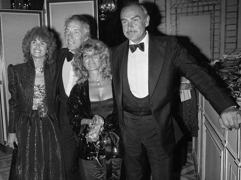 Sean Connery and his wife Micheline, alongside Jean-Pierre Cassel and his wife Anne Cassel pose during the 7th American Film Festival of Deauville. AFP