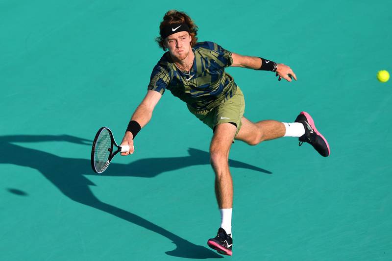 Andrey Rublev returns the ball to Stefanos Tsitsipas. AFP