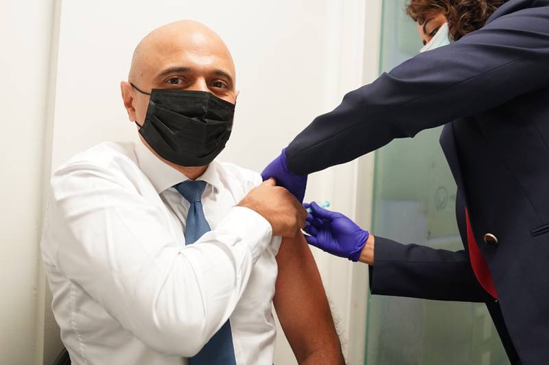 Health Secretary Sajid Javid receives his Covid-19 booster jab from Nikki Kanani, Medical director primary care NHS England, at a pharmacy in central London. Picture date: Wednesday November 17, 2021. PA