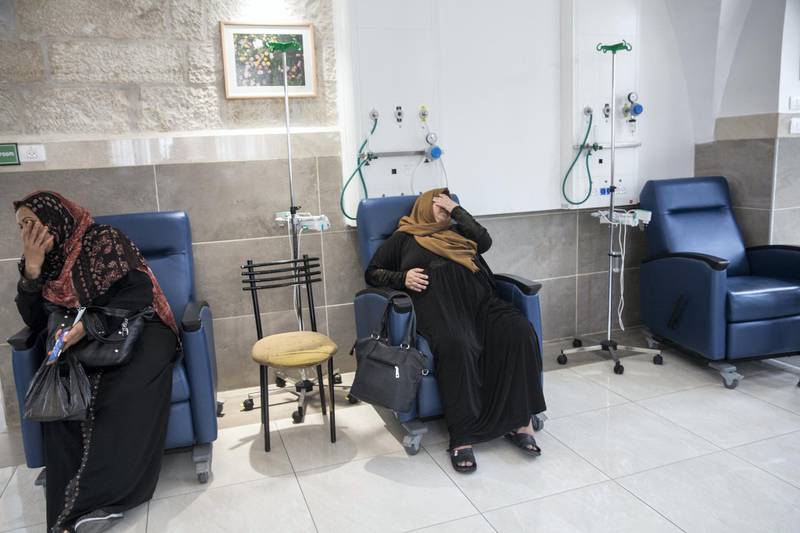 Palestinian women wait for their chemotherapy treatment at the oncology department of the Augusta Victoria Hospital on the Mt. of Olives in east Jerusalem on September 12,2018.

Last Friday the Trump administration announced cutting aid to Palestinians that slashes funds for cancer patients and others in critical need being treated in the East Jerusalem network of hospitals. The State Department said it was slashing $25 million . US President Donald Trump said that he is pressuring the Palestinians to negotiate a peace deal with Israel .(Photo by Heidi Levine For The National).
