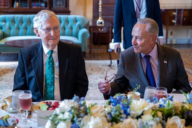 Senate Majority Leader Chuck Schumer and Senate Minority Leader Mitch McConnell chat prior to a luncheon at the US Capitol.  EPA