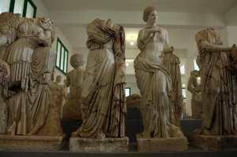 Dozens of statues stand inside a cement warehouse on theCyrenaica archaeological site, stashed where looters cannot reach them.Credit: Iason Athanasiadis/The National *** Local Caption ***  Libya12 023.JPG