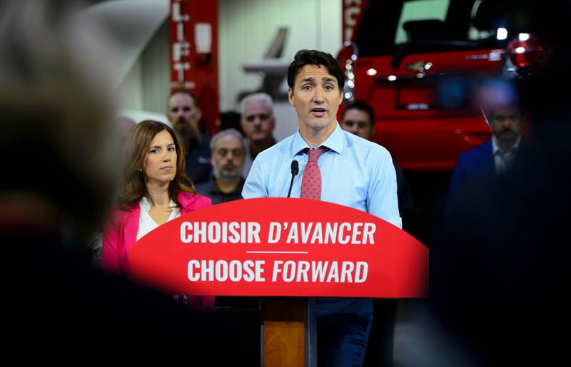Liberal Leader Justin Trudeau makes a policy announcement and holds a media availability at an electric vehicle car dealership during a campaign stop in Trois-Rivieres, Quebec, on Friday, Sept. 13, 2019. (Sean Kilpatrick/The Canadian Press via AP)