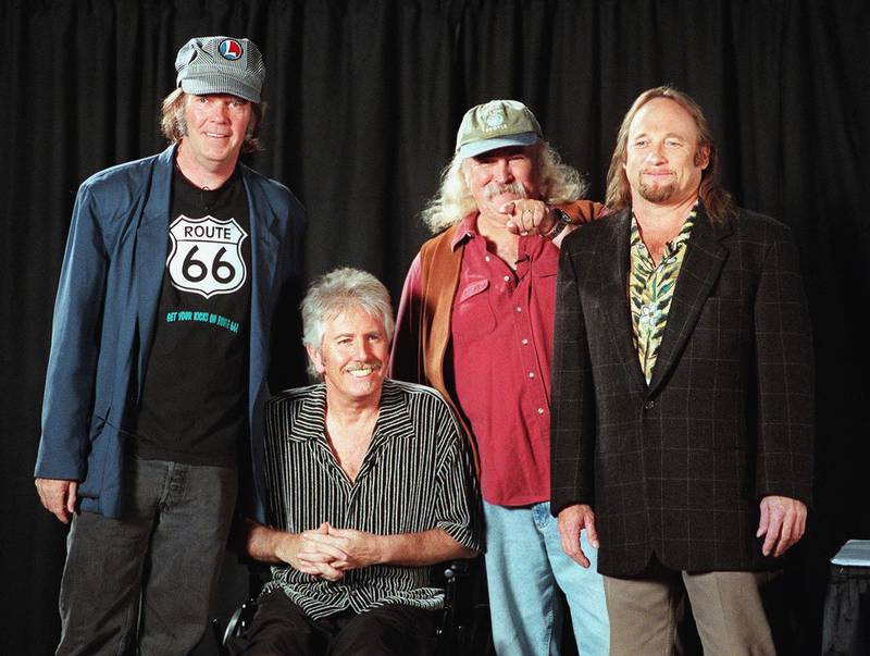 David Crosby, second from right, in 1999, with Stephen Stills, right, Graham Nash, second from left, and Neil Young. AFP