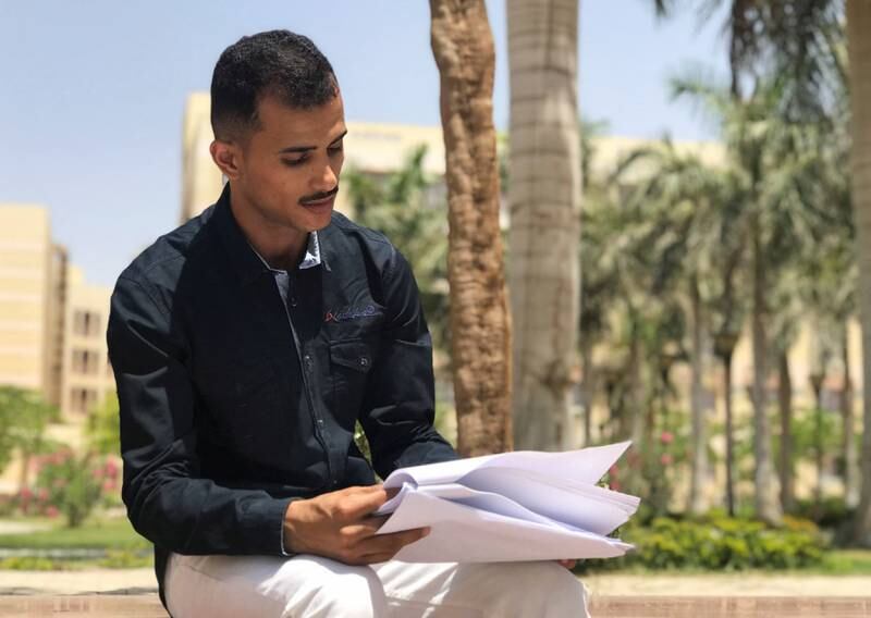Ezzedine Mohsen, 26, left his home in war-torn Yemen and settled in Cairo after receiving a scholarship that helped him to set up a charity offering support to fellow refugees. All photos: Reuters