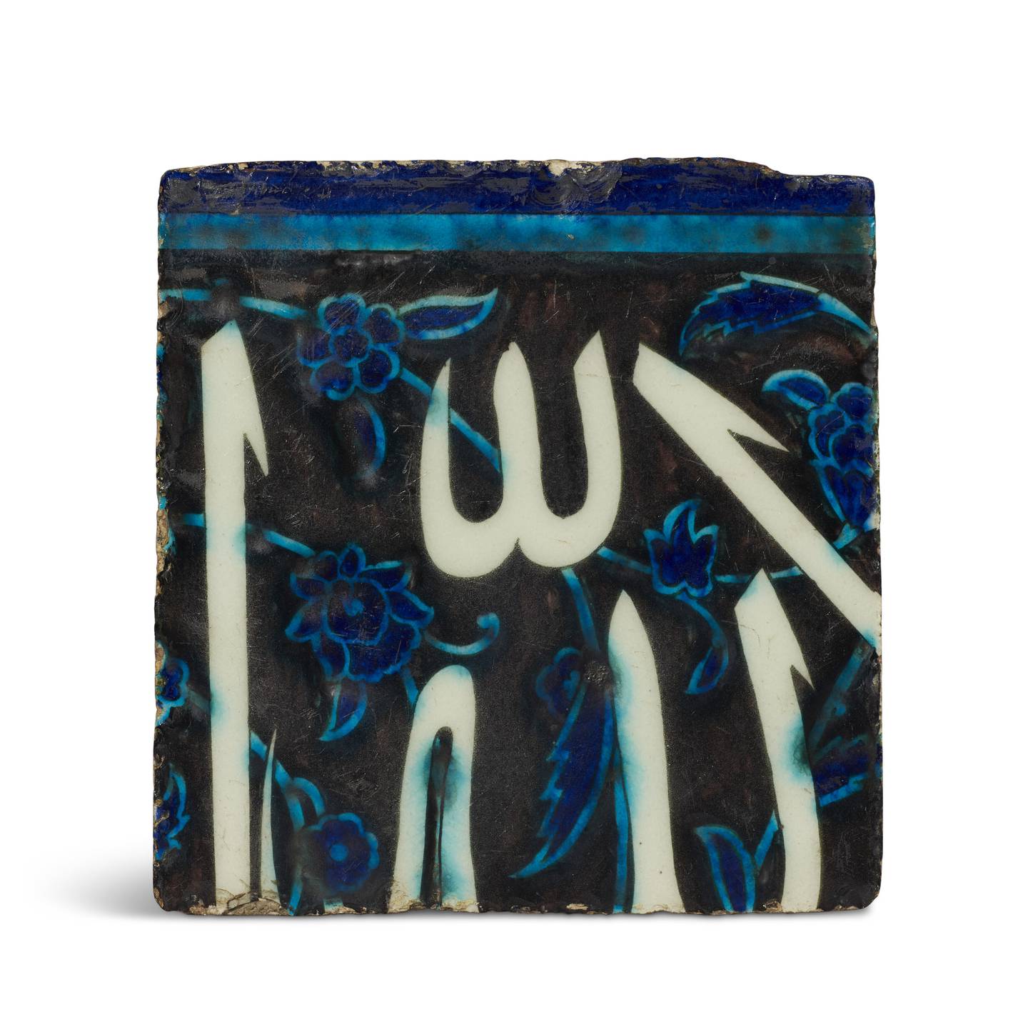 One of Moumni’s personal favourite pieces on display at Christie's at the moment is a white, turquoise and cobalt-blue 'Dome of the Rock' 17.5cm x 18cm mid-16th-century ceramic tile made in Ottoman Syria or Palestine with an inscription in thuluth visible against a background of flowering vines. Photo: Christie's
