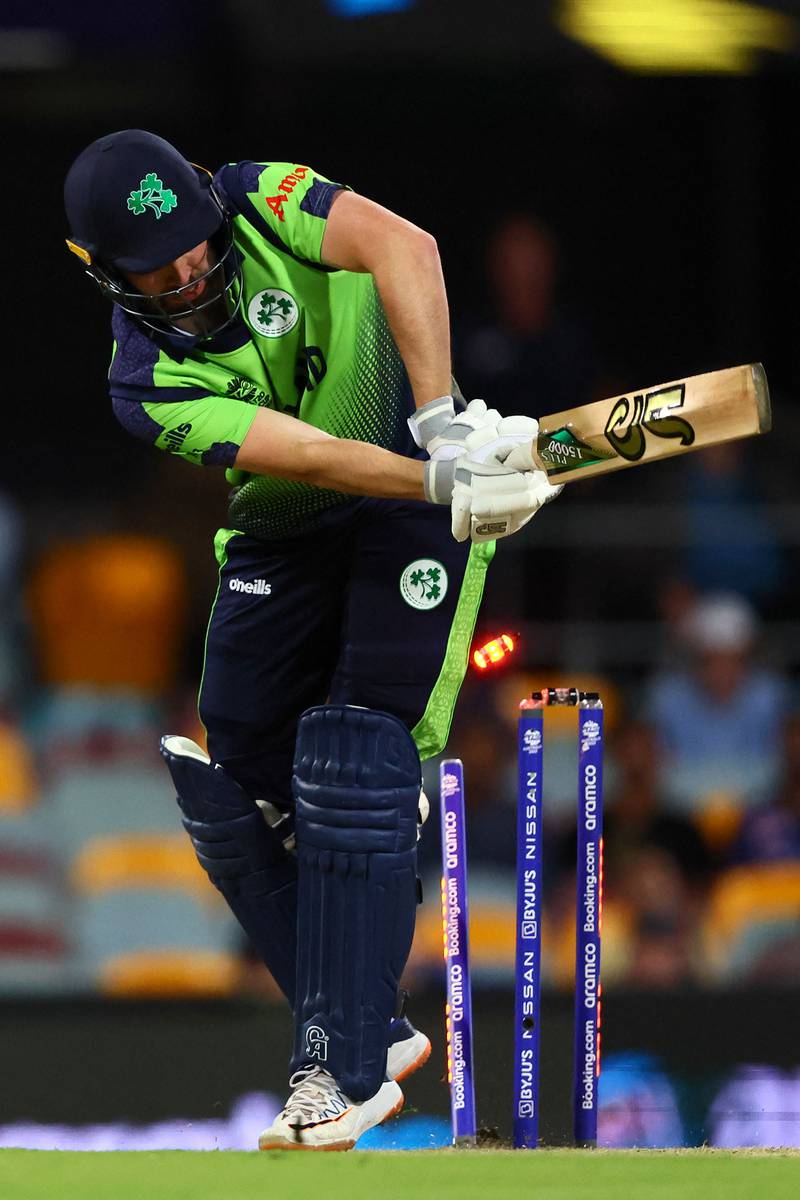 Ireland's captain Andrew Balbirnie is bowled by Australia's Pat Cummins. AFP
