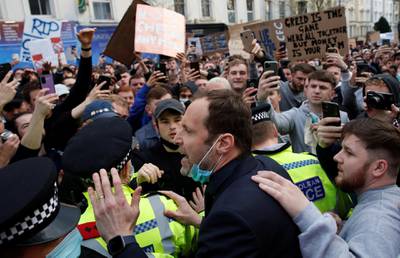 Former Chelsea player Petr Cech talking to fans protesting outside Stamford Bridge