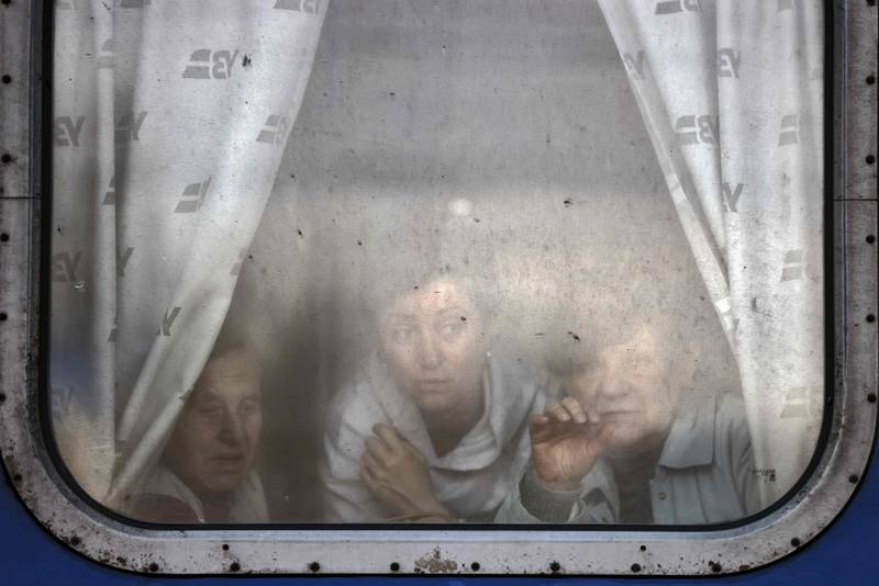 Women bid farewell to relatives as they leave the Slovyansk central station in the Donbas region. AFP