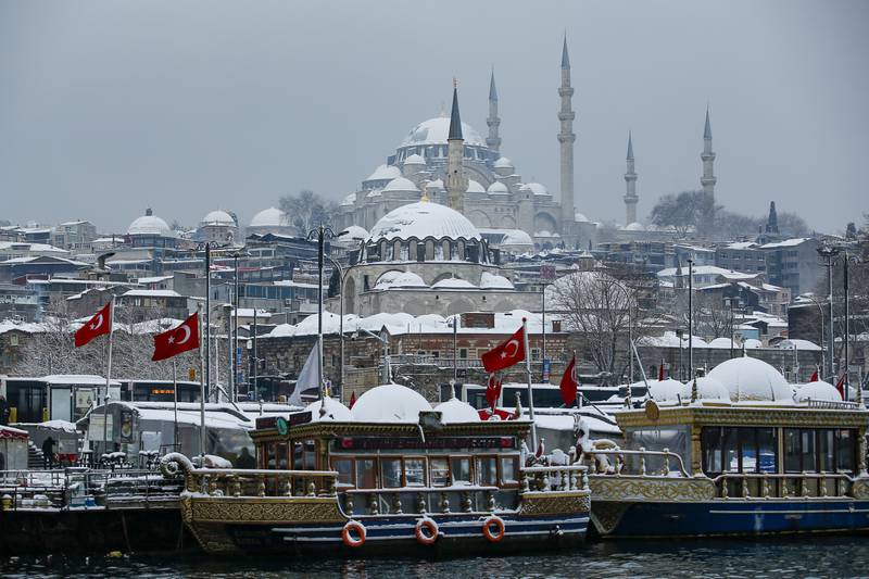 Tourist boats dock in the Golden Horn with Suleymaniye Mosque in the background. AP
