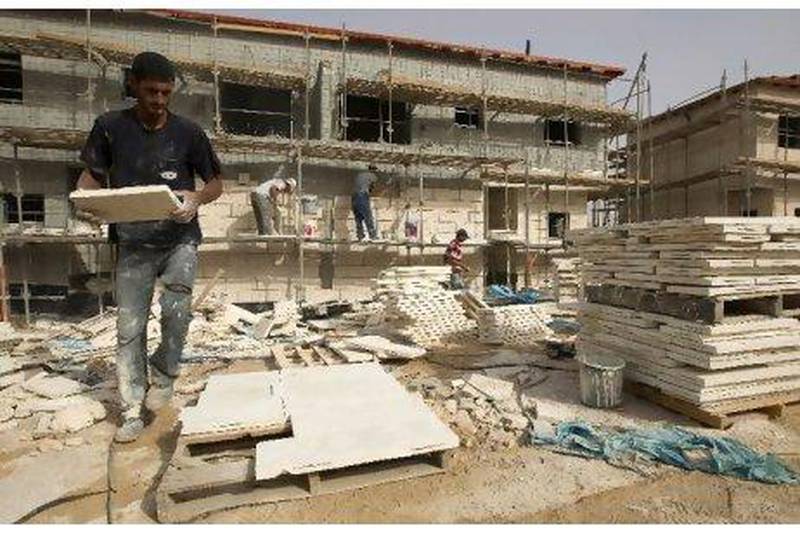 Settlement construction represents one of the last Palestinian toe-holds in the Israeli labour force. Above, work in progress in the West Bank settlement of Ariel.