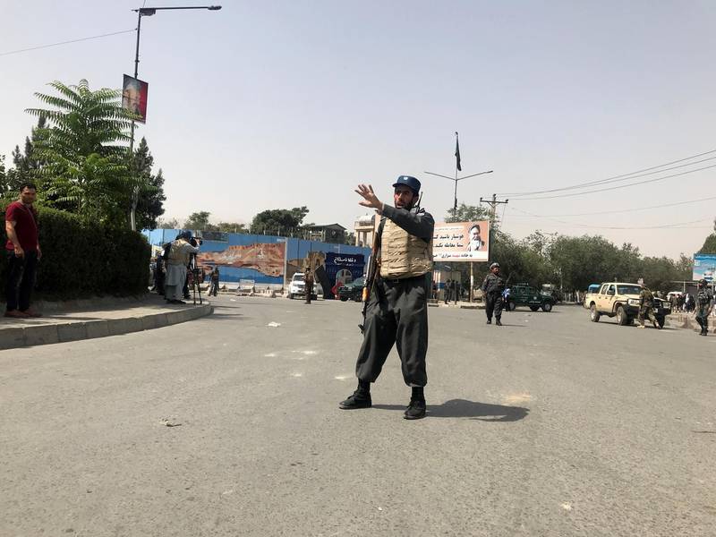 An Afghan policeman keeps watch near the site of a blast in Kabul, Afghanistan August 7, 2019. REUTERS/Omar Sobhani