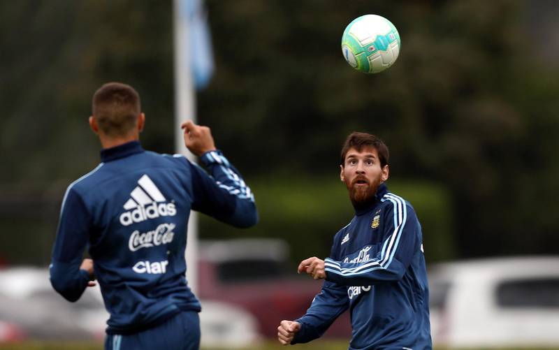Football Soccer - Argentina's national soccer team training - World Cup 2018 Qualifiers - Buenos Aires, Argentina - August 29, 2017 - Argentina's Lionel Messi controls the ball next to Mauro Icardi during a training session ahead match against Uruguay. REUTERS/Marcos Brindicci