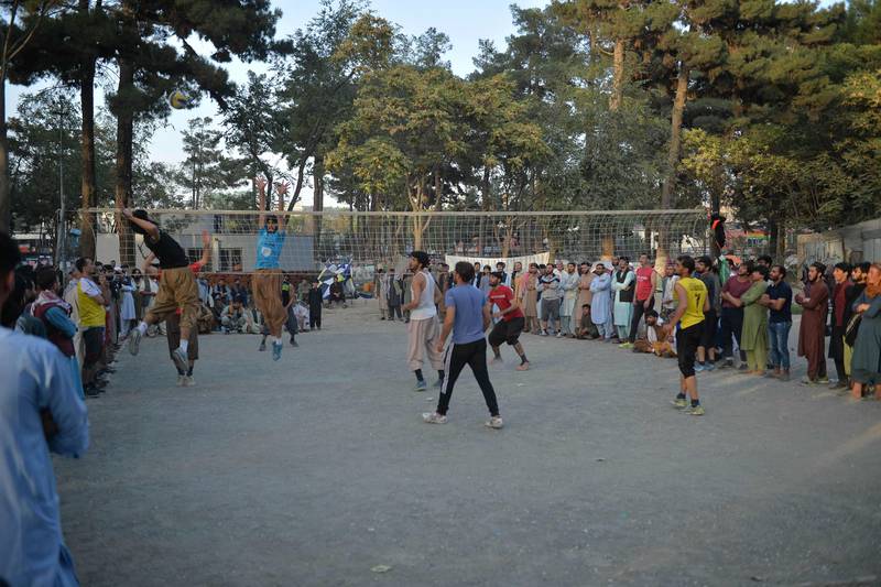 Youths play volleyball at Shahr-e Naw Park, Kabul. AFP