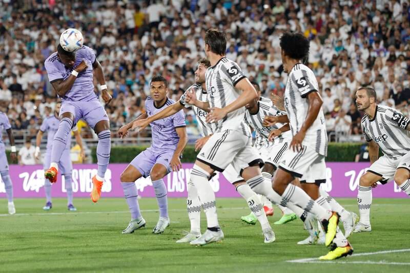 Real Madrid defender David Alaba heads the ball against Juventus. EPA