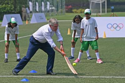 International Olympic Committee president Thomas Bach plays cricket at an event in Mumbai on October 9, 2023.  FPA